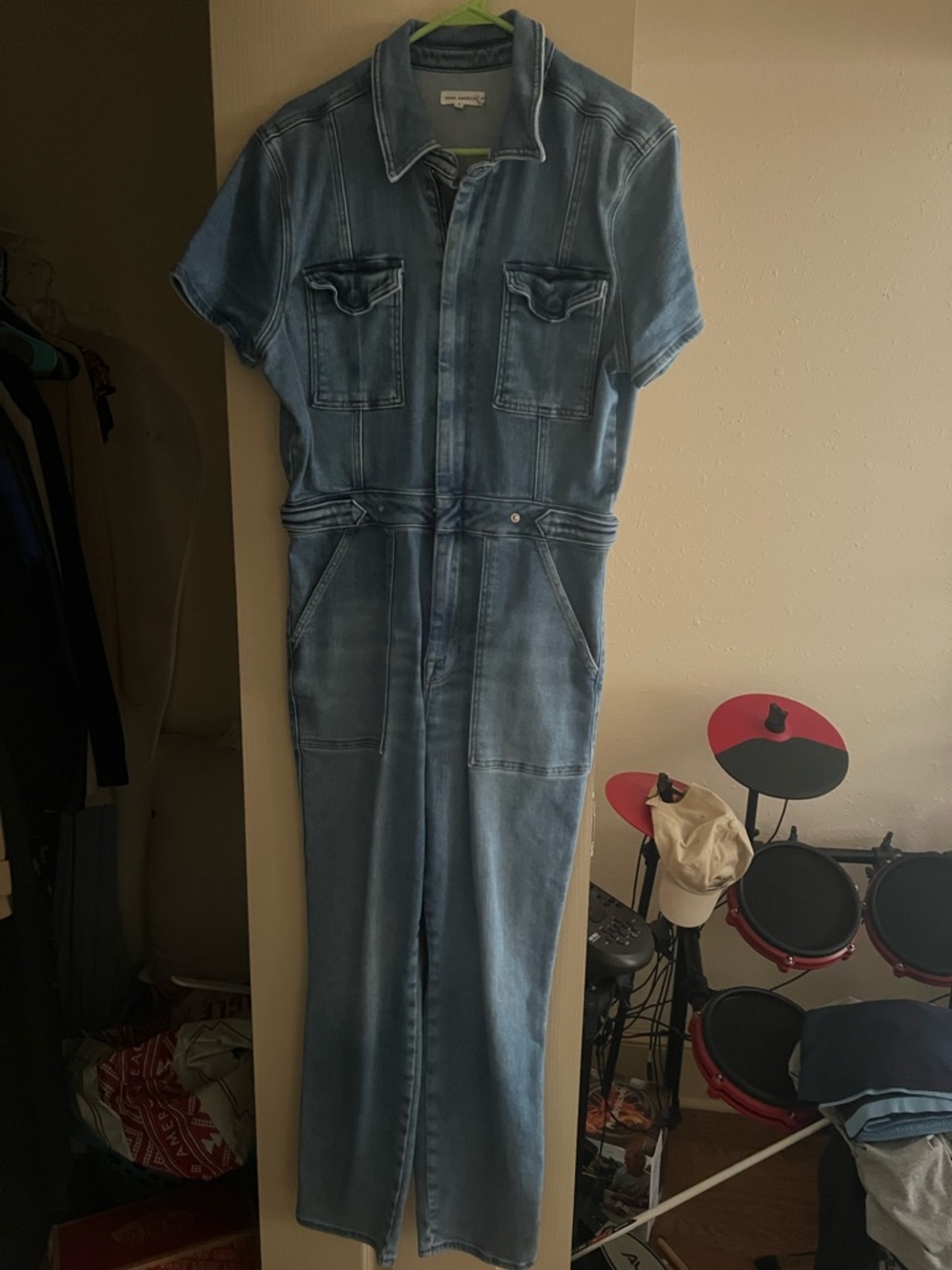 Good American Distressed Light Blue Denim Jumpsuit